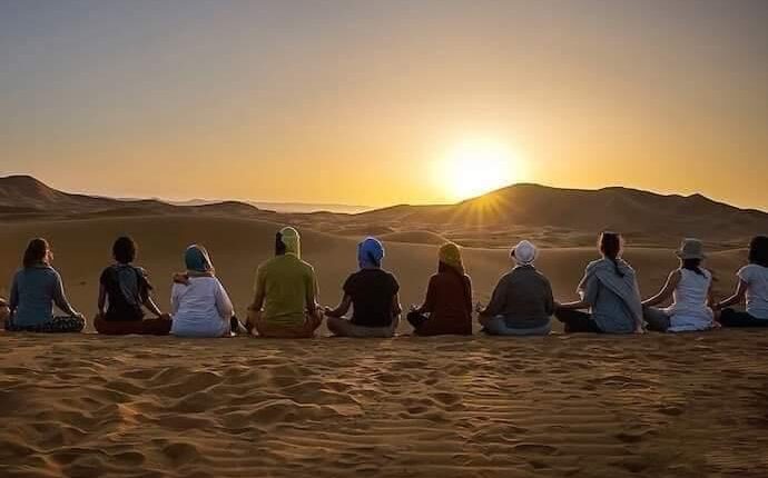 together in the dunes camel trekking sahara Morocco